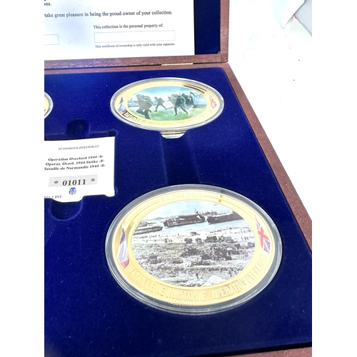 655 - 2 Boxed Collection of Windsor Mint d-day & defining moments Coins & plaques with c.o.a and certifica... 