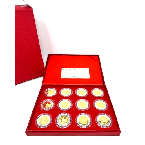 656 - china money stamp company boxed set of commemorative medals of china animal figures