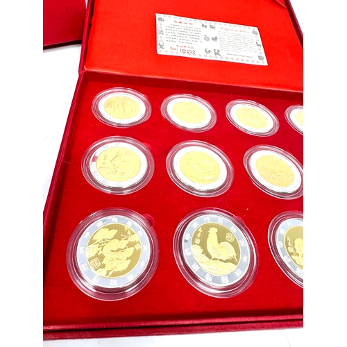 656 - china money stamp company boxed set of commemorative medals of china animal figures