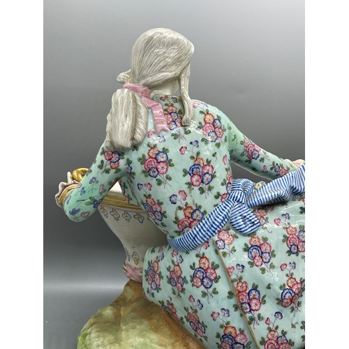 585 - Antique meissen large figure of a reclining lady cross swords mark to base height 24 cm length 30 cm