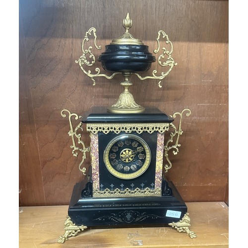 65 - Marble/slate mantel clock with gilding measures approx 21 inches tall by 13.5 inches wide