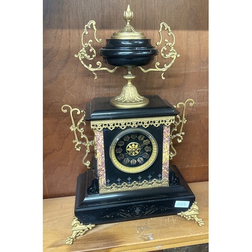 65 - Marble/slate mantel clock with gilding measures approx 21 inches tall by 13.5 inches wide