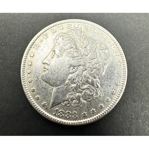 669 - 1883 Morgan Silver Dollar