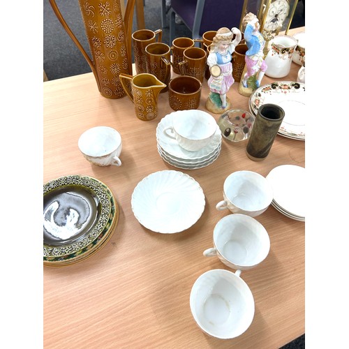 129 - Selection of collectables to include part tea services, bisque figures, retro part coffee set, candl... 