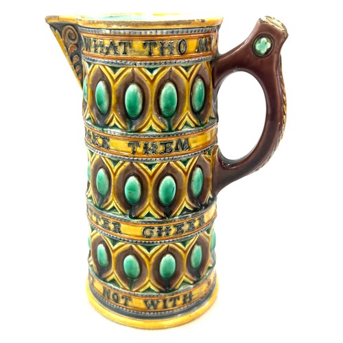 573 - Antique Wedgwood Majolica Motto Pitcher, has sustained a crack, approximate height 22cm