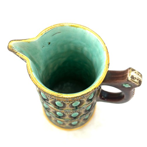 573 - Antique Wedgwood Majolica Motto Pitcher, has sustained a crack, approximate height 22cm