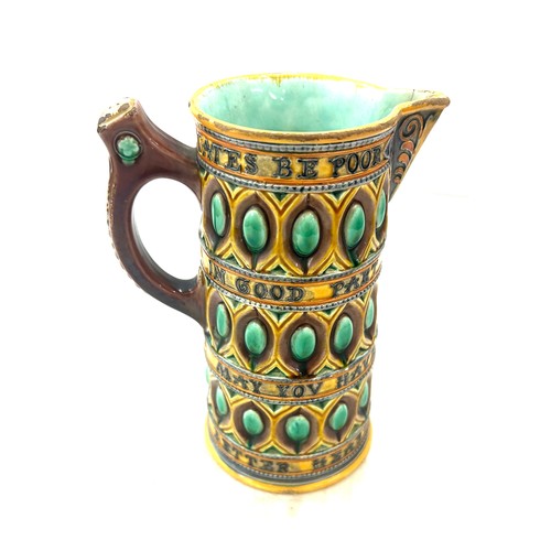 573 - Antique Wedgwood Majolica Motto Pitcher, has sustained a crack, approximate height 22cm