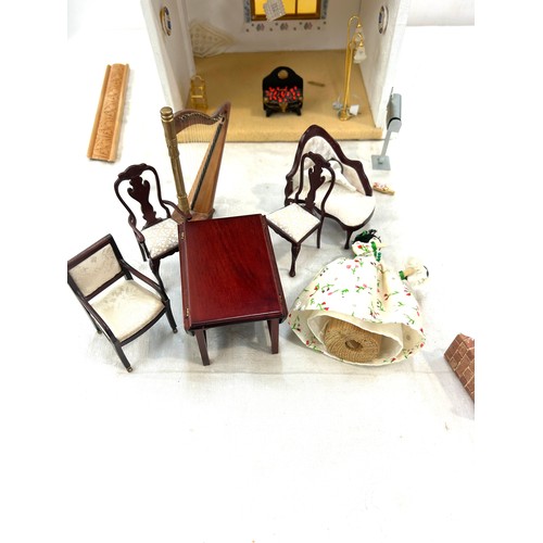 130 - Narrow dolls house with furniture, approximate measurements of dolls house Height 23 inches, x 10 x ... 