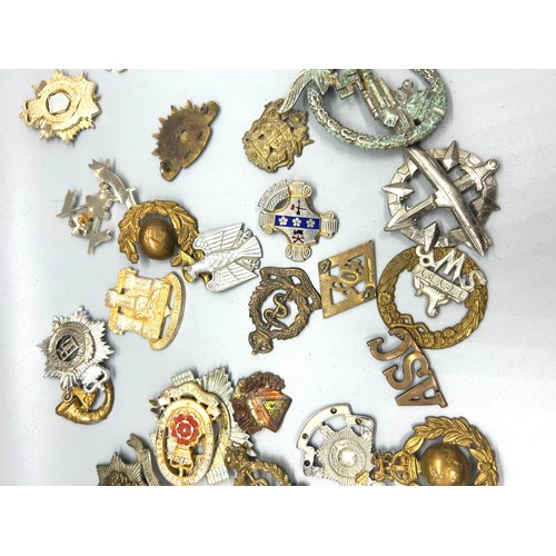 400 - Selection of vintage cap badges, to include military and police pieces