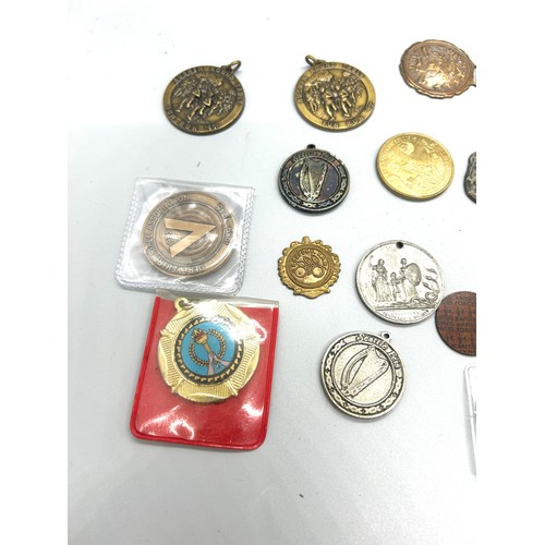 417 - Selection of foreign medallions / coins etc