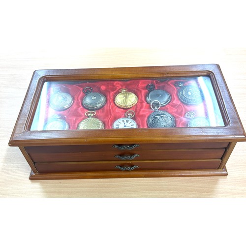 452 - Wooden showcase containing 20 pocket watches, all untested