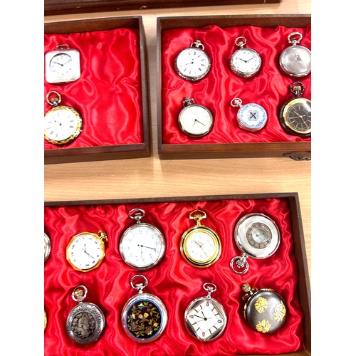 451 - Wooden showcase containing 28 pocket watches, all untested