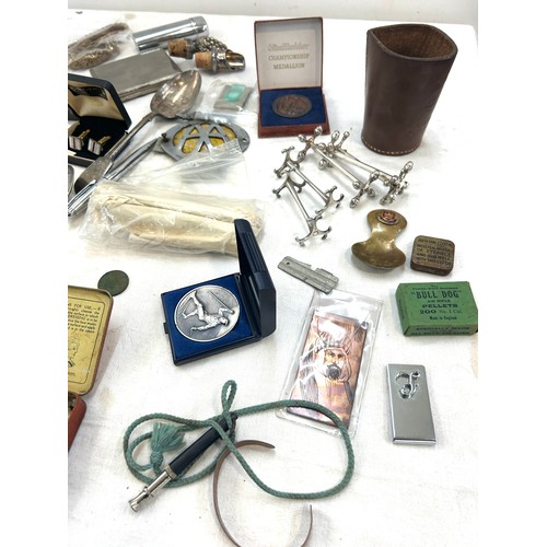 265 - Selection of small collectable items to include car badge, cufflinks, cigarette cases, medallions, l... 