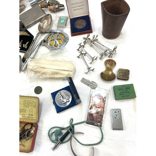 265 - Selection of small collectable items to include car badge, cufflinks, cigarette cases, medallions, l... 