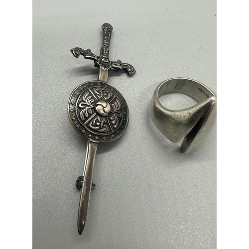 528 - Modernist silver ring and a scottish brooch