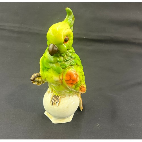 595 - Vintage oriental porcelain parrot with glass eyes 10 inches tall