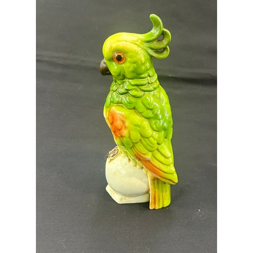 595 - Vintage oriental porcelain parrot with glass eyes 10 inches tall