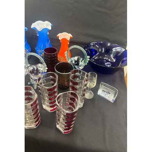 211 - Large selection of coloured glassware includes bags, vases, madina, french glass glasses pink and wh... 