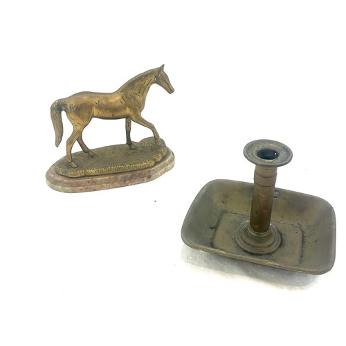 576 - Vintage brass candle stick and a brass horse on a marble base