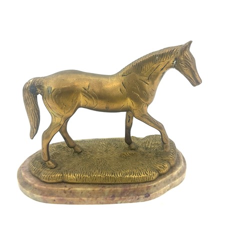 576 - Vintage brass candle stick and a brass horse on a marble base