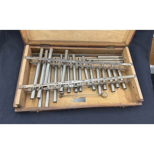 266 - Cased Douglas and co xylophone, in need of repair