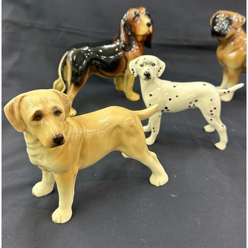 140 - Large selection of assorted dog figures includes Cooper craft etc