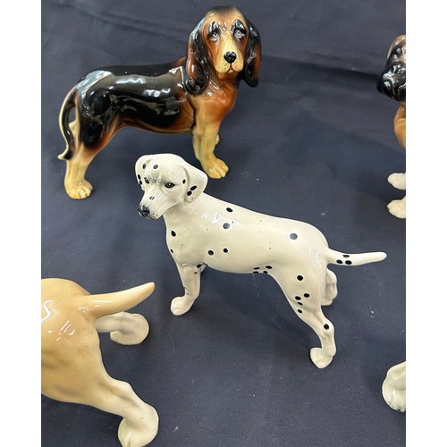 140 - Large selection of assorted dog figures includes Cooper craft etc