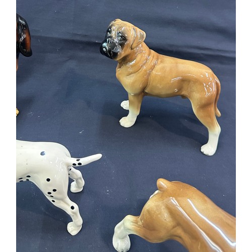 140 - Large selection of assorted dog figures includes Cooper craft etc