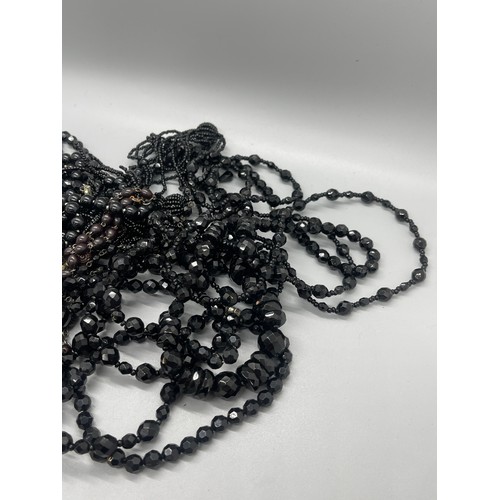 565 - 9 vintage black French jet, mourning jewellery