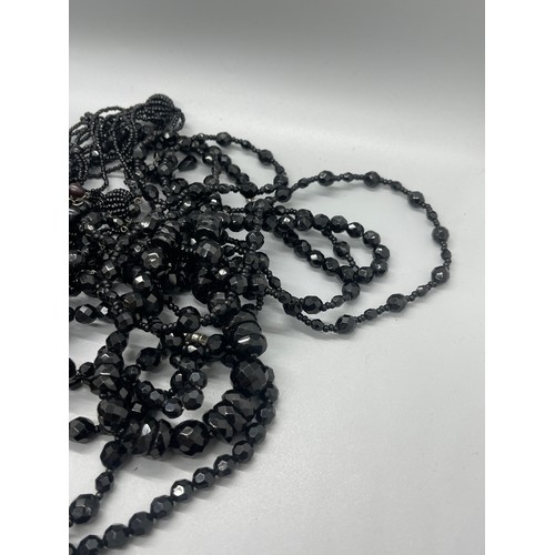 565 - 9 vintage black French jet, mourning jewellery