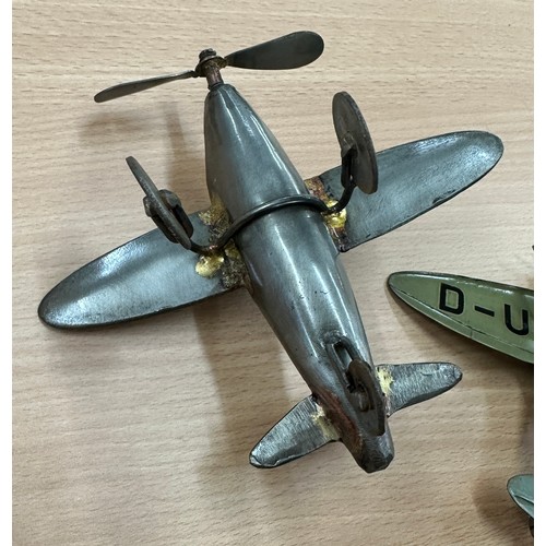 558 - Two tin/metal model planes one German D-U DET