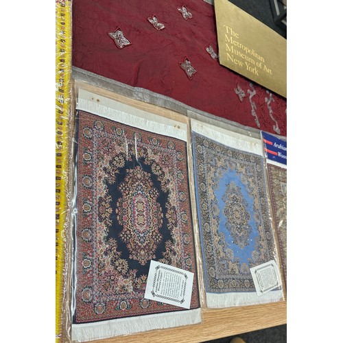 139 - Selection of Arabian miniature woven carpet and other