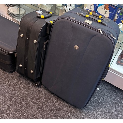 297 - Selection of five various sized suitcases- A/F