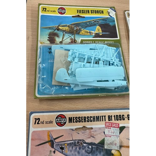 89 - Four Air fix scale model construction kits to include ' Fiesler Storch' ' Spad VII', ' Tiger moth', ... 