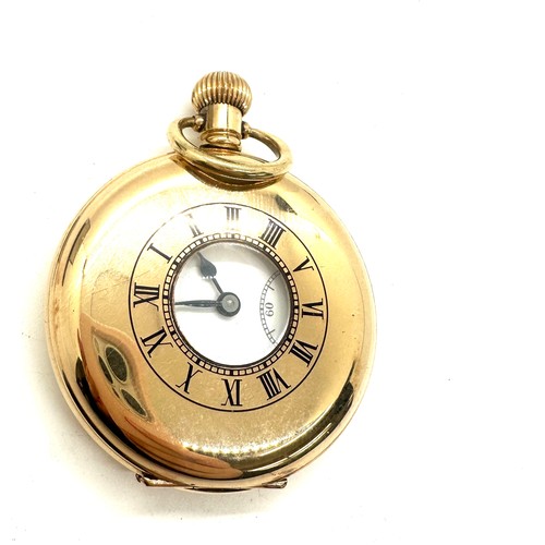 420 - Antique gold plated half hunter pocket watch. No wear to the plate and in working condition- 50mm in... 