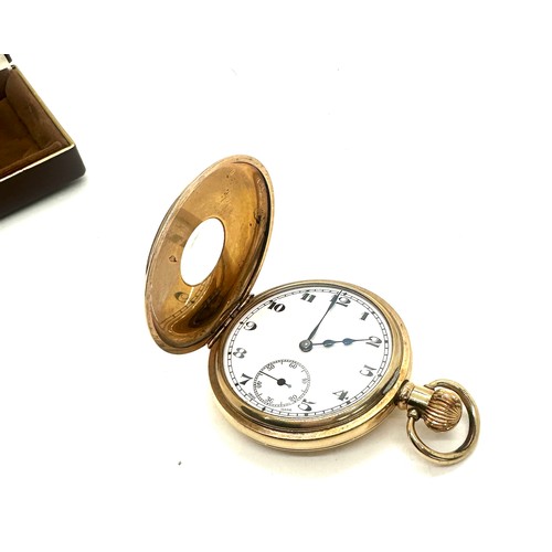 420 - Antique gold plated half hunter pocket watch. No wear to the plate and in working condition- 50mm in... 