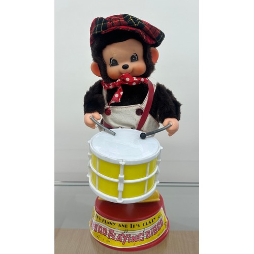 7 - Vintage 1970's battery operated monchhichi drumming toy