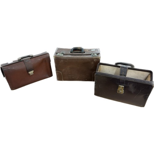 180 - Three vintage leather bags