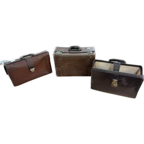 180 - Three vintage leather bags