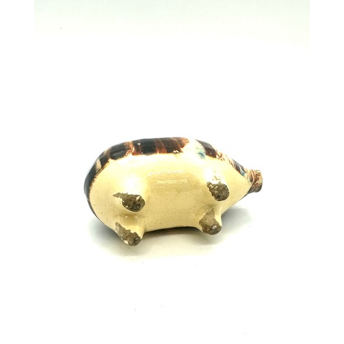 568 - Vintage slip ware pig money bank measures approx 4 inches wide by 2.5 inches tall