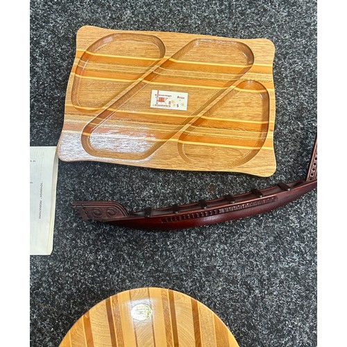 146 - Three pieces of New Zealand Wood to include bowl, boat and biscuit tray