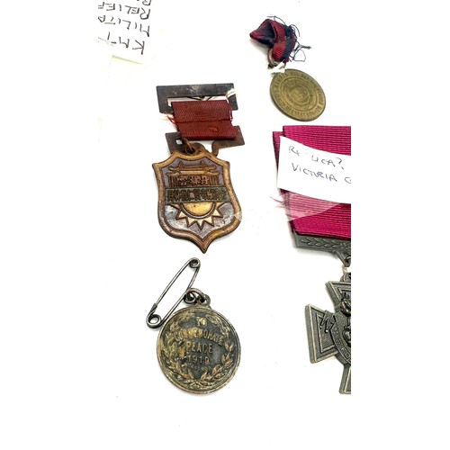 415 - Selection of replica medals includes Victorian cross, WW1 medals etc