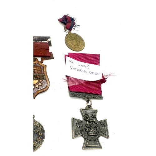 415 - Selection of replica medals includes Victorian cross, WW1 medals etc