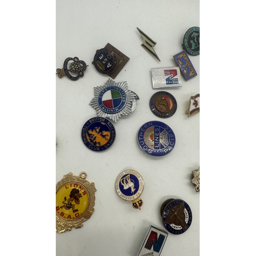 414 - Large selection of assorted pin badges