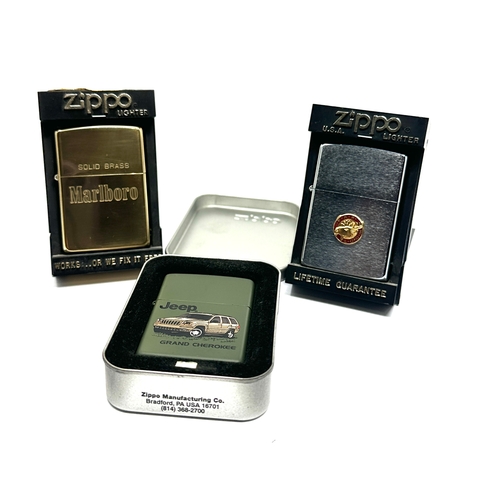3 cased Zippo lighters inc marlboro jaguar etc all in as new condition