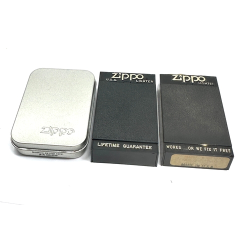 3 cased Zippo lighters inc marlboro jaguar etc all in as new condition