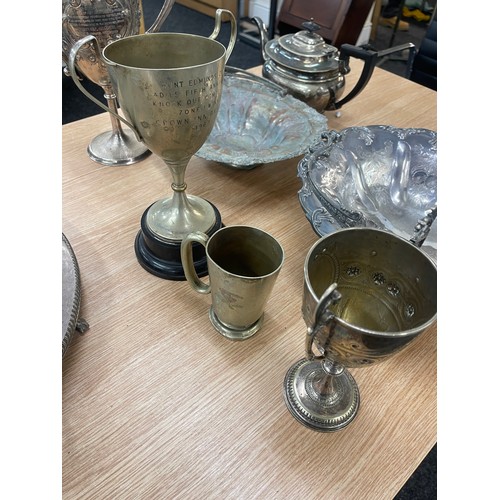 142 - Large selection of silver plated items includes trophies, tea pot, bowls etc