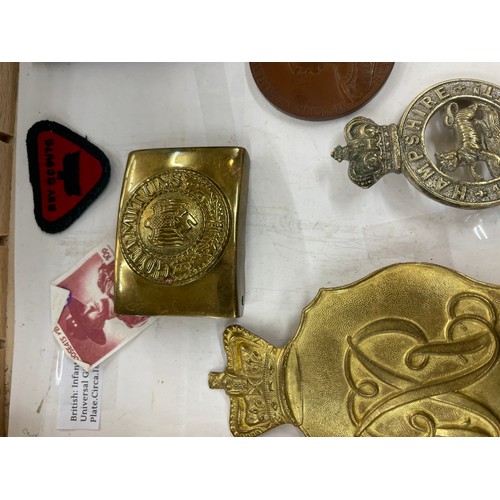 410 - Selection of collectables includes belt buckle, medal etc