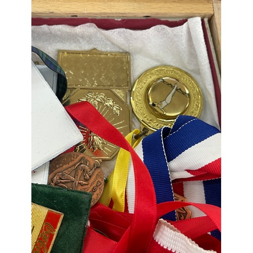 609 - Large selection of assorted medals includes olympic badges etc