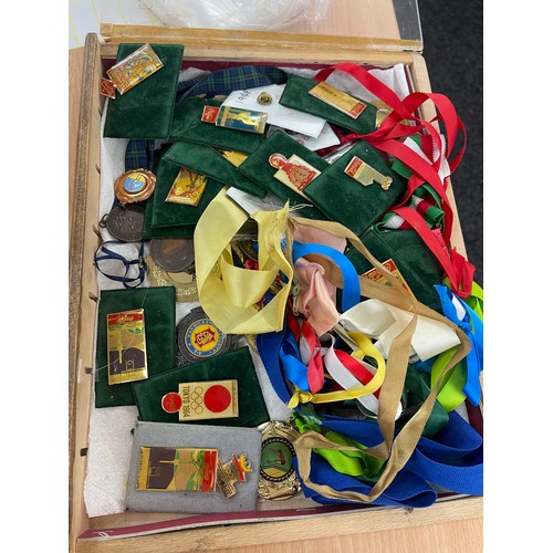 609 - Large selection of assorted medals includes olympic badges etc